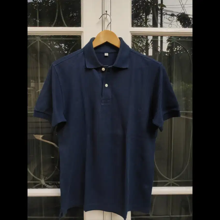 Kaos berkerah polo Uniqlo