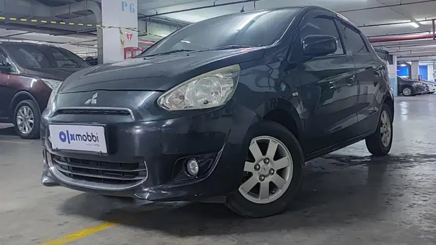 Mitsubishi Mirage 1.2 Exceed Bensin-AT 2013 Hitam /