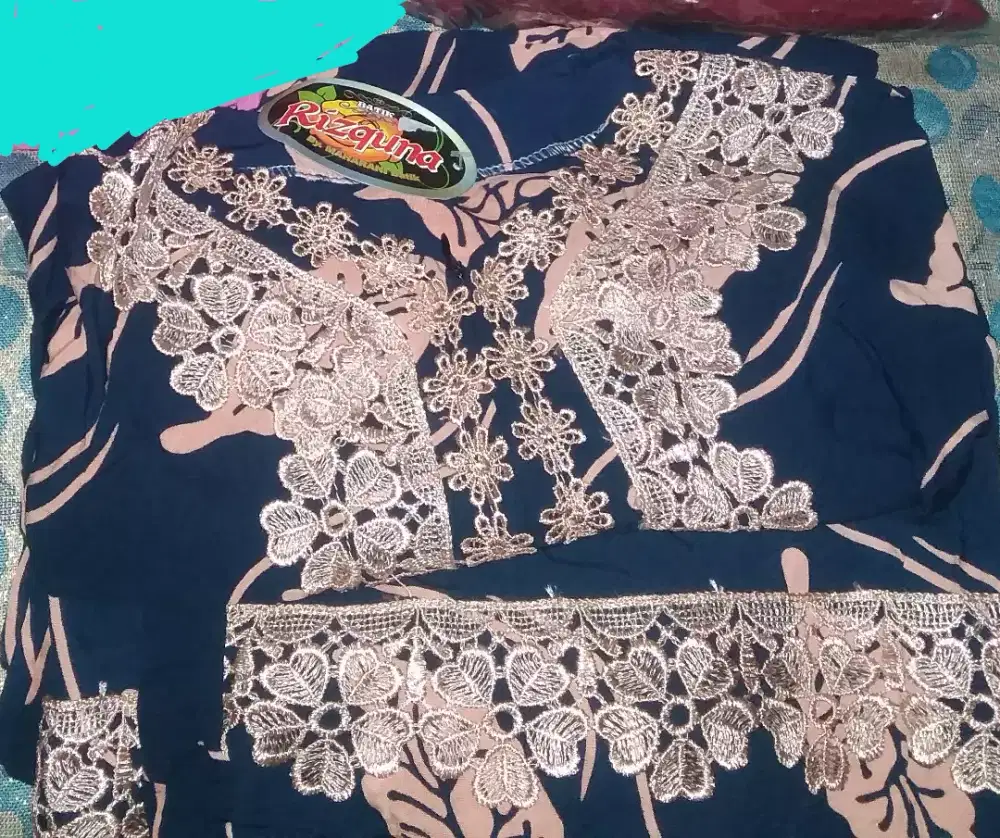 Daster batik merk rizquna