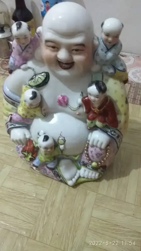 Patung keramik Buddha Maitreya Milefo