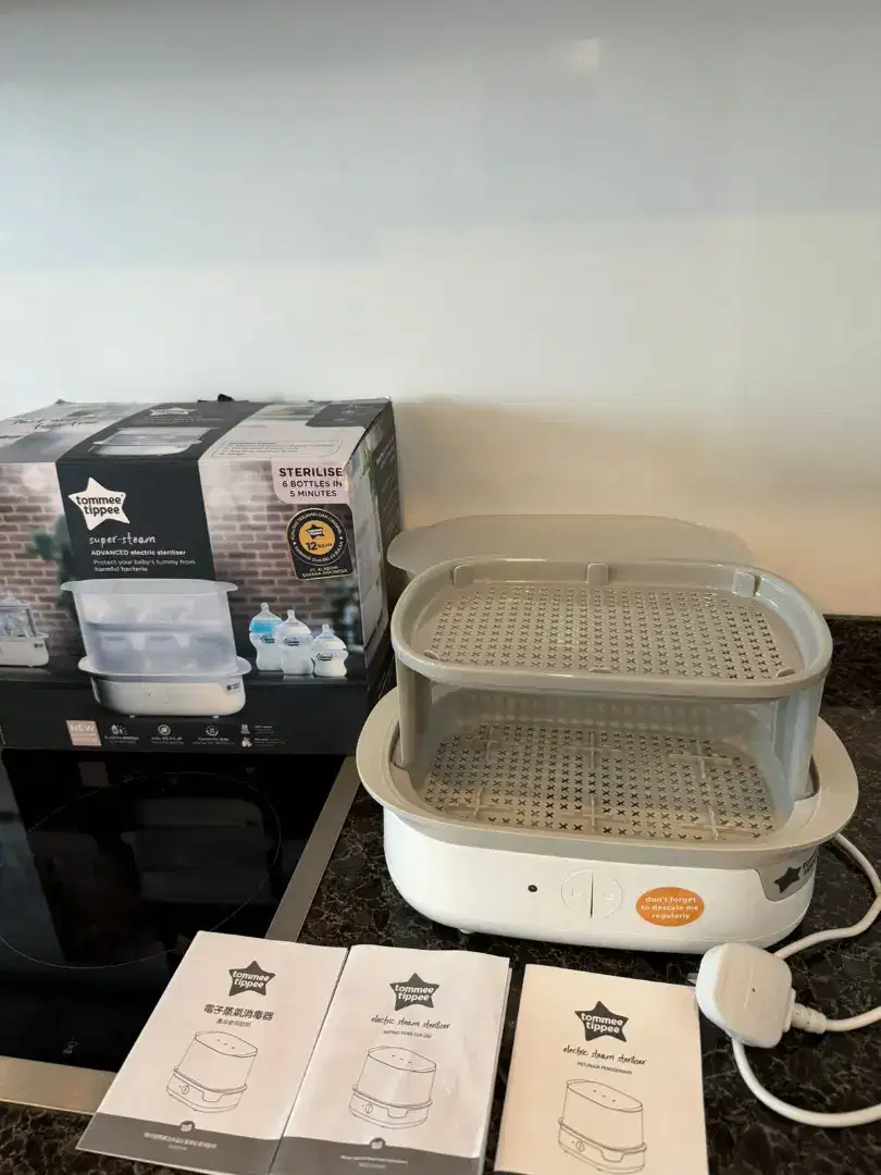 Tommee Tippee Electric Steam Steriliser great cond, 1 time use only