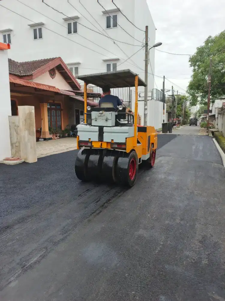 Pengaspalan dan marka jalan