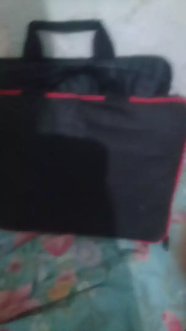 Tas dvd laptop wrna merah pokemon