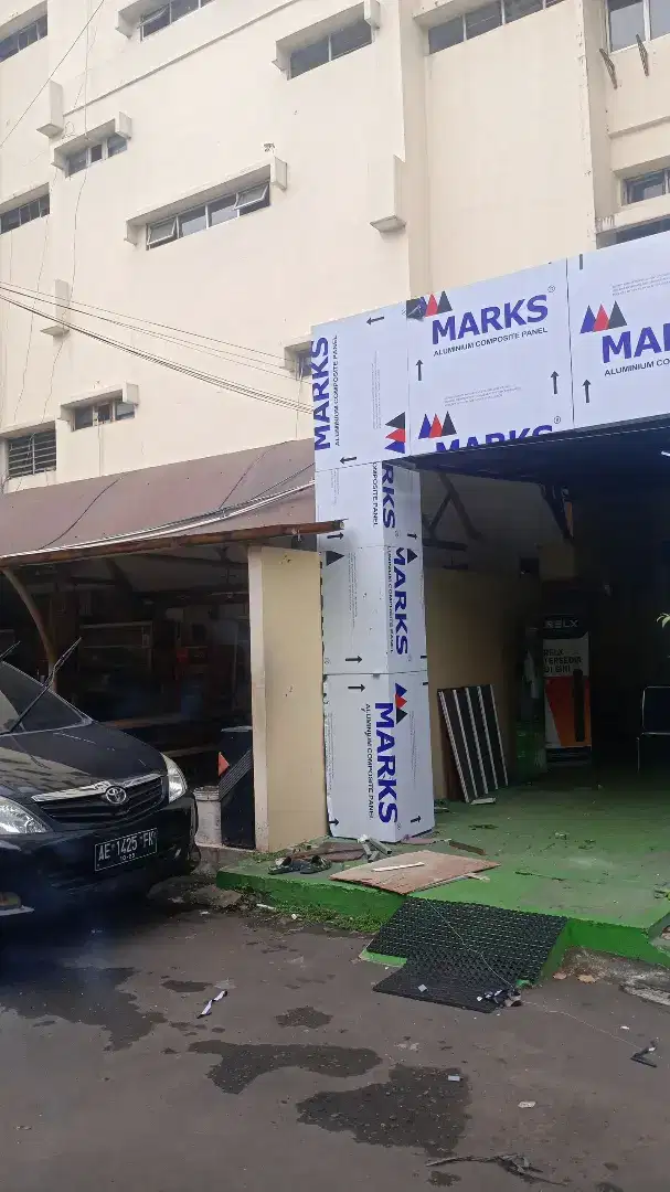 Tukang ACP pasad
