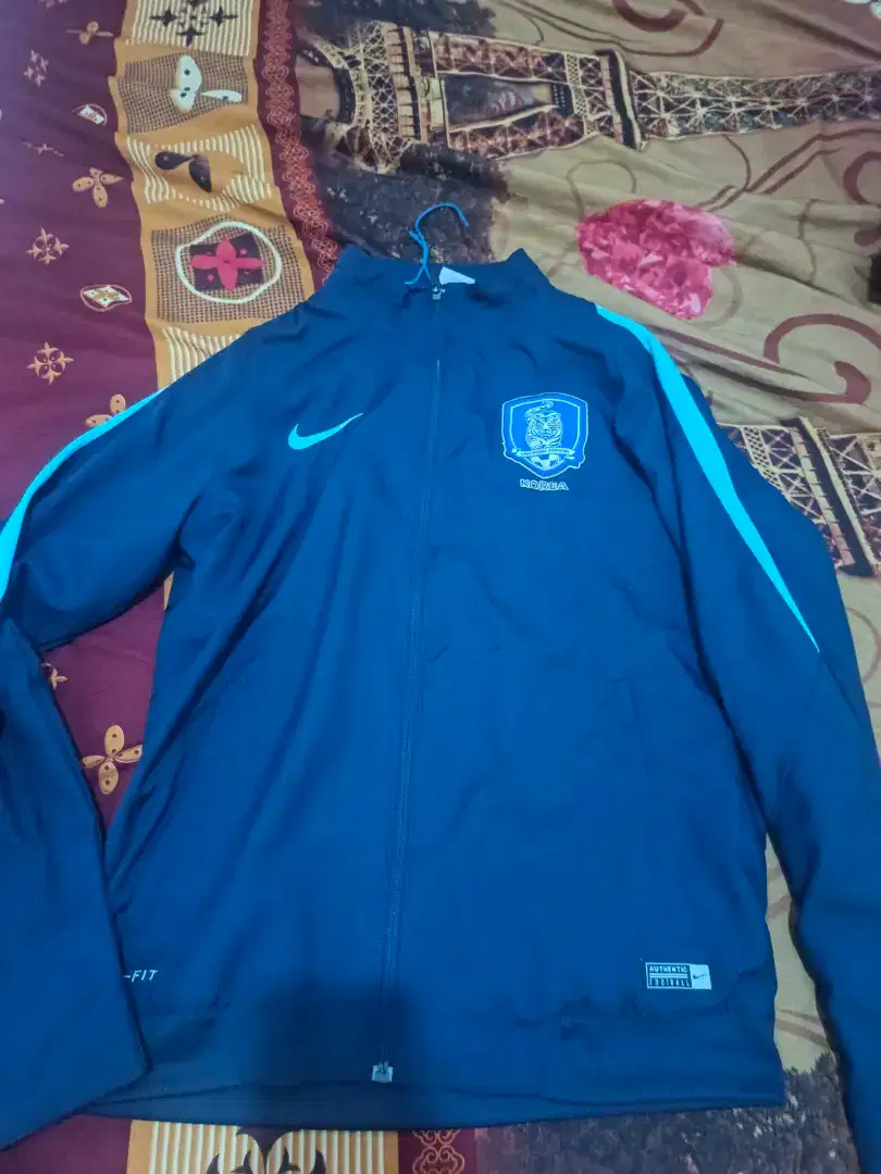 Jaket football nike