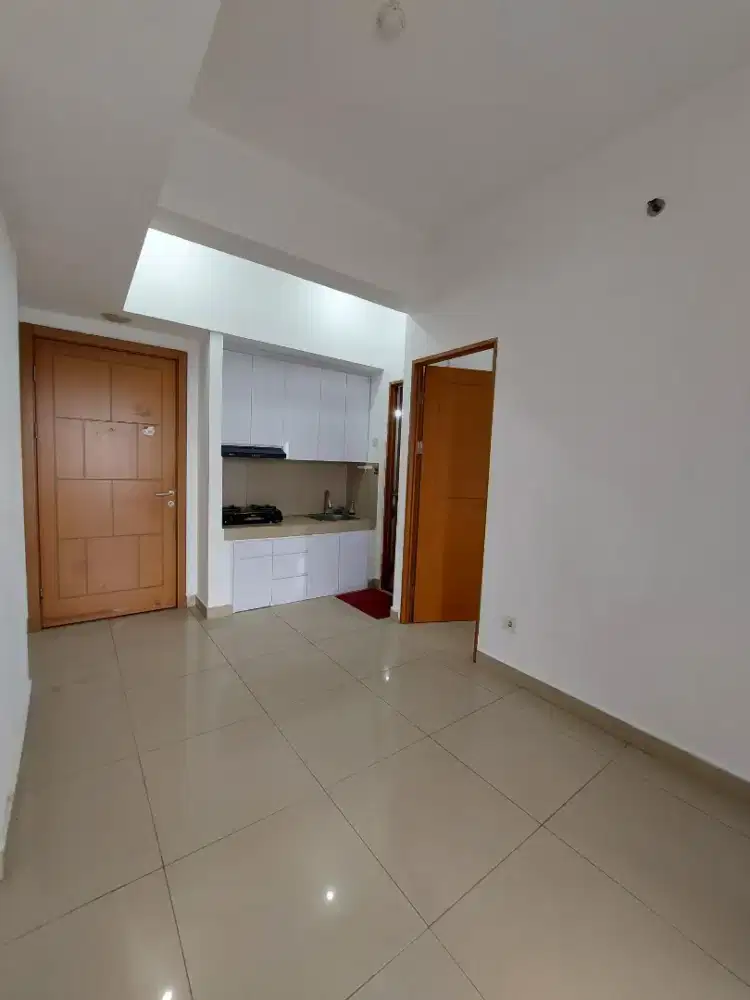 Disewakan tahunan murah 2 BR unfurnish pasang Ac 2 apartement the nest