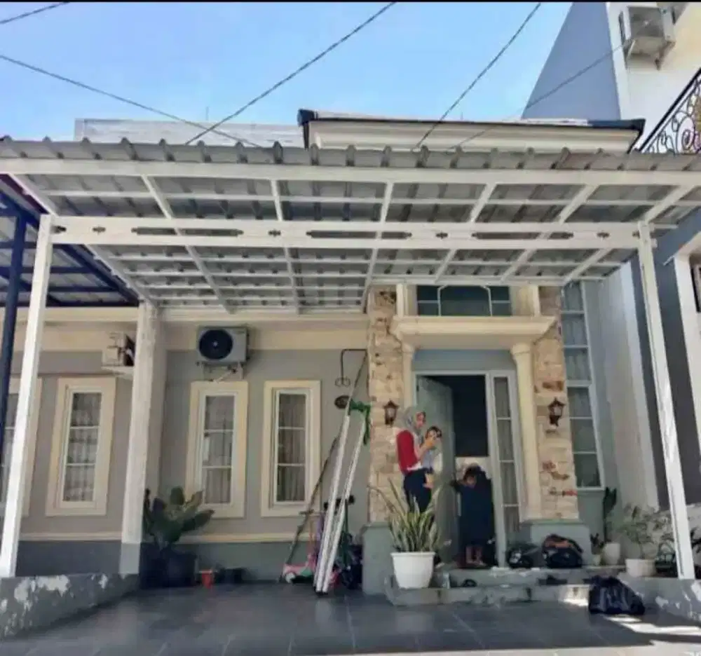 Pemasangan kanopi baja ringan dan atap rumah
