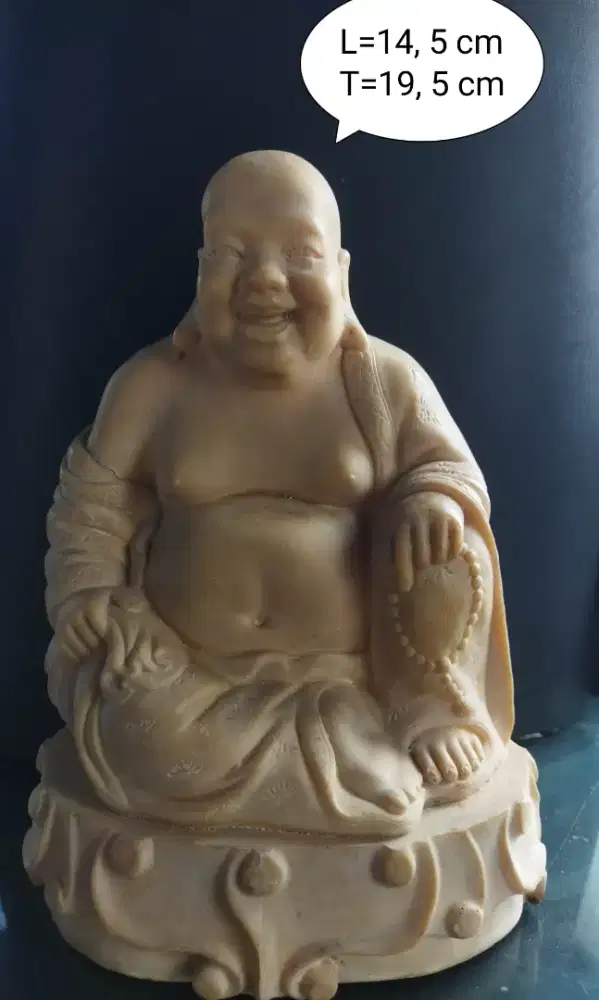 Patung Budha bahagia