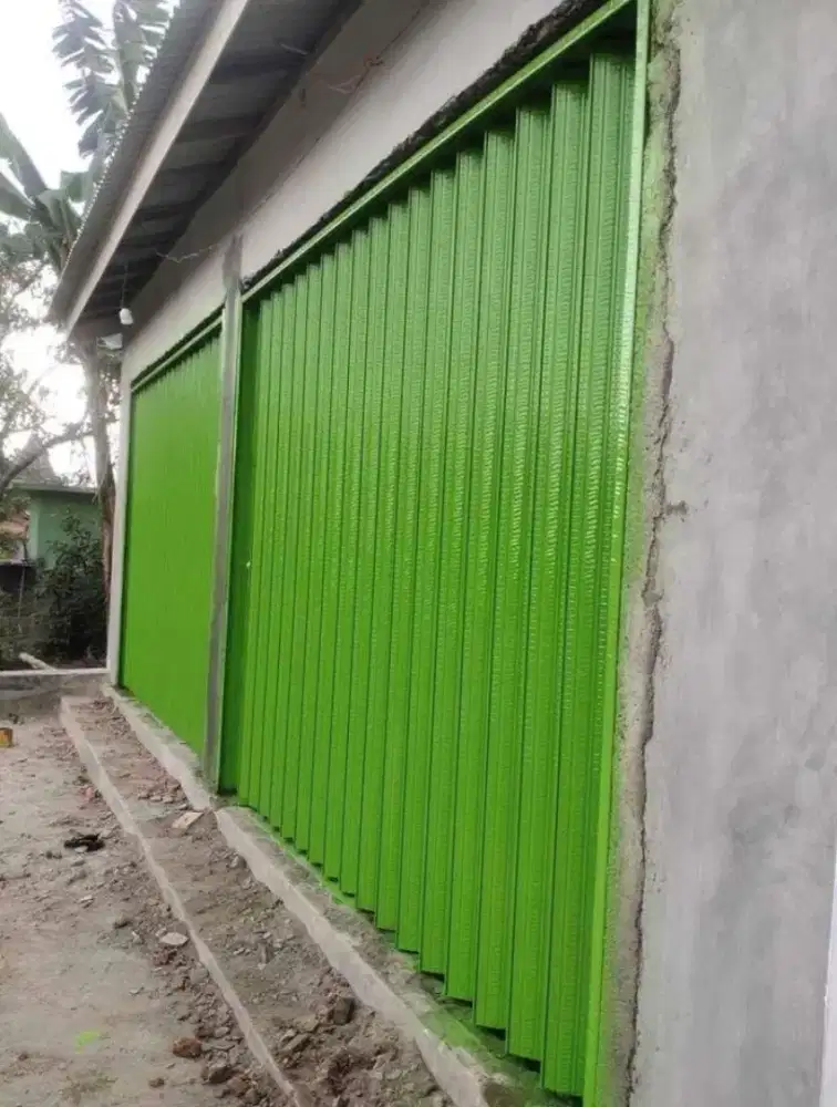 Folding gate rolling door