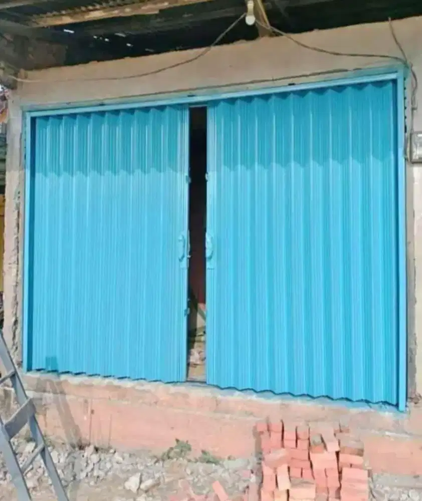 Folding gate rolling door