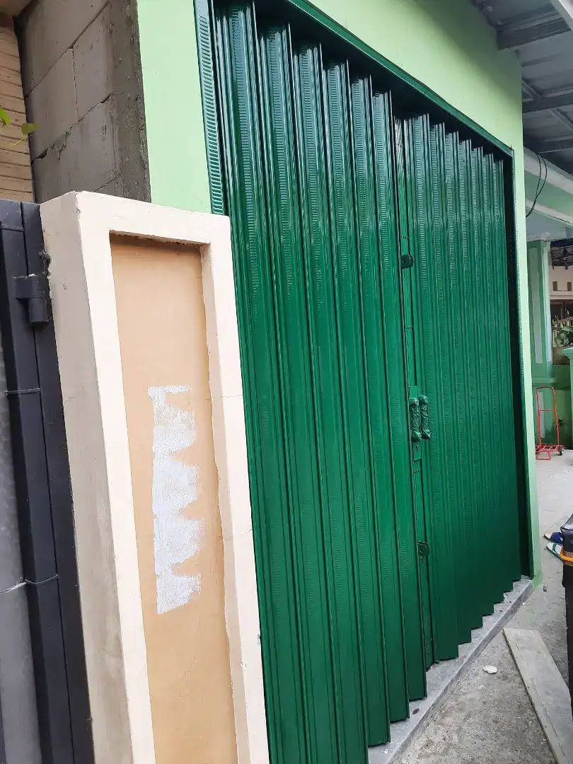 Folding gatte roling door