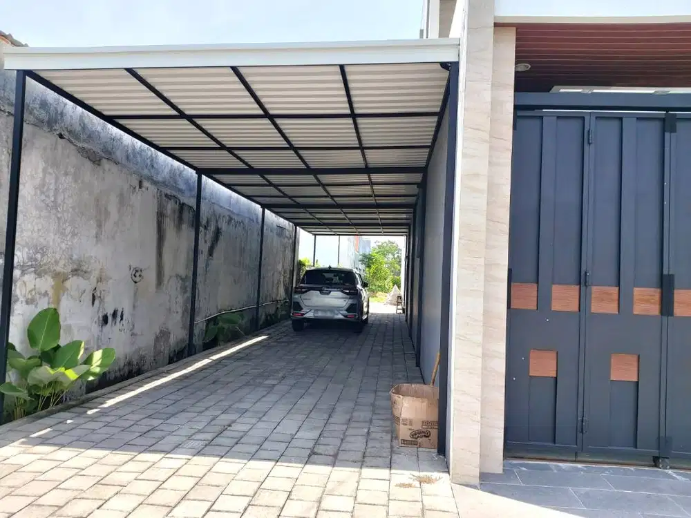 Rumah Mewah dengan Kolam Renang dekat Jalan Gito Gati