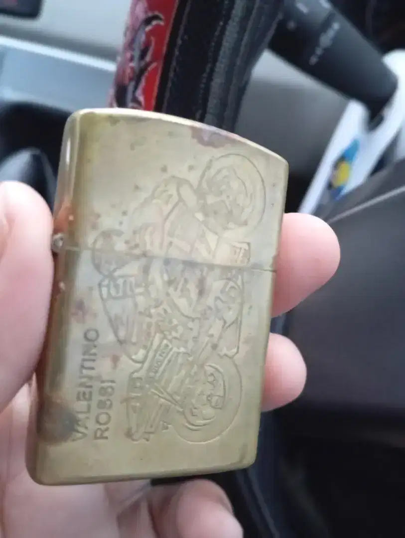 Zippo asli usa motif moto GP gold...nego