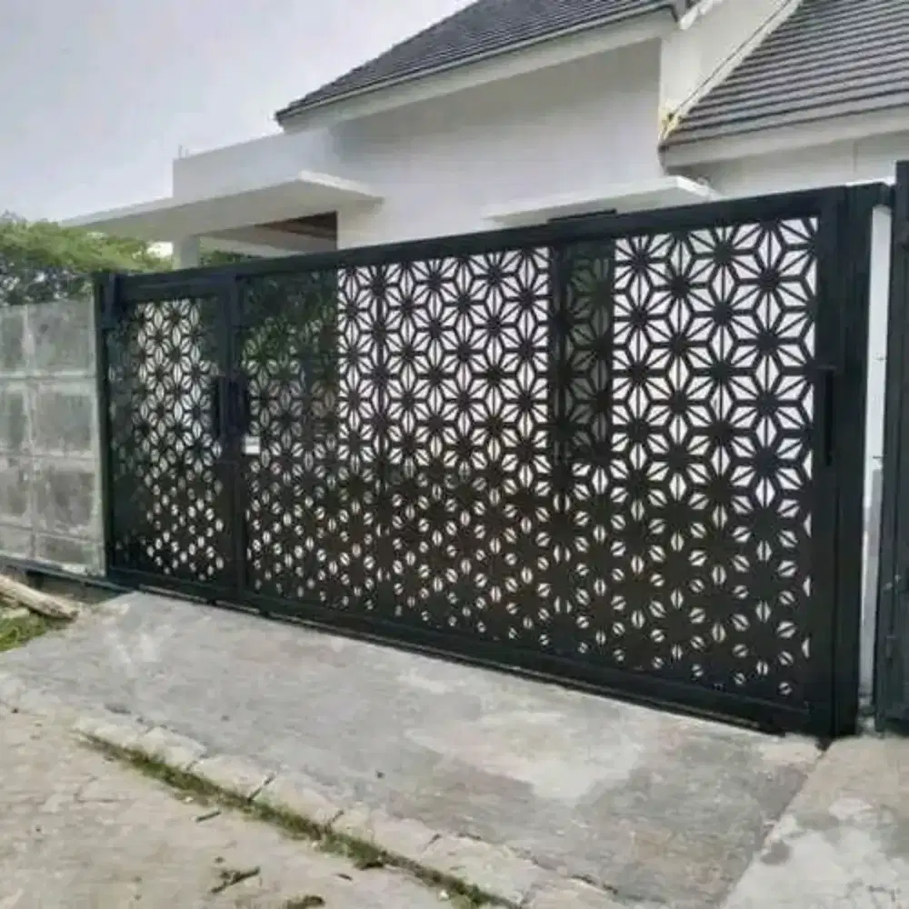 Pintu garasi terbaru motif cuttingg layser/moderen