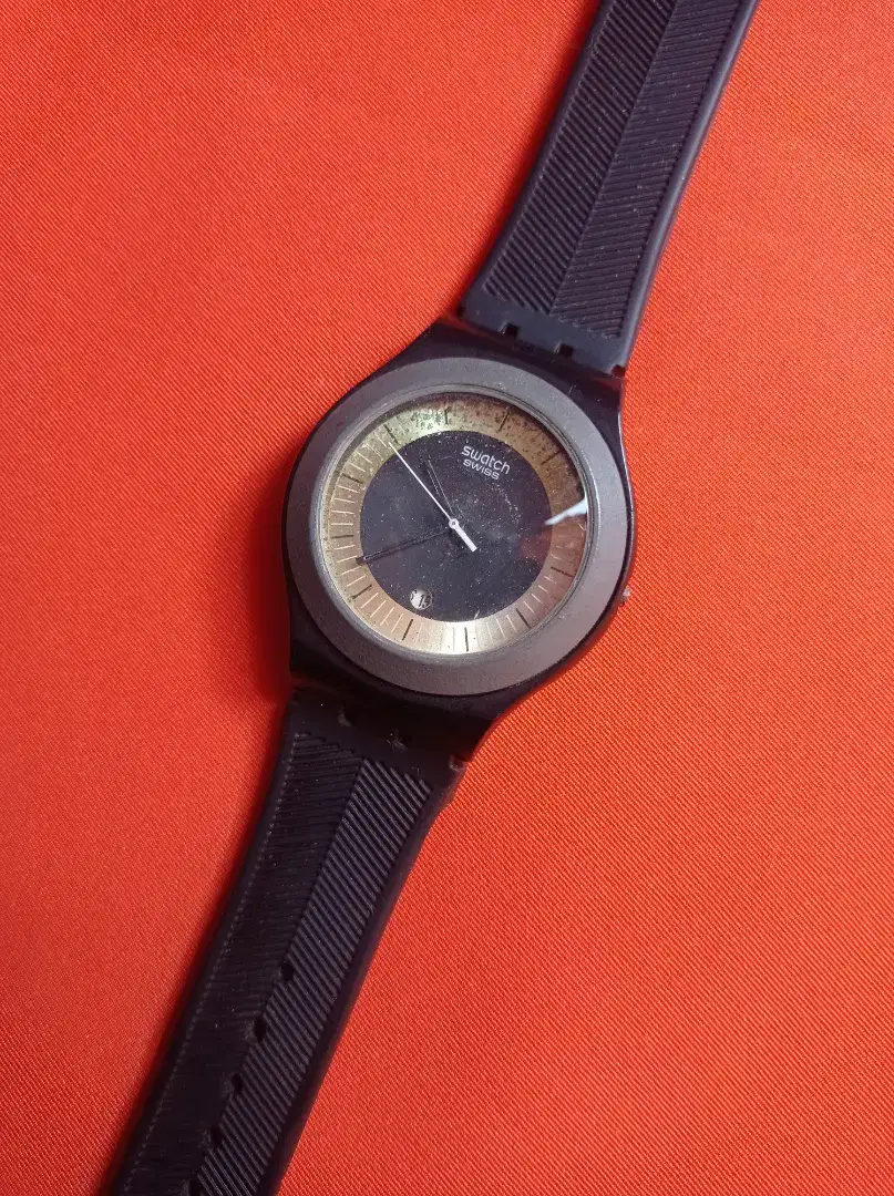 SWATCH
IRONY
DIAPHANE
PATENTED
SWISS MADE
BACK ALUMINIUM