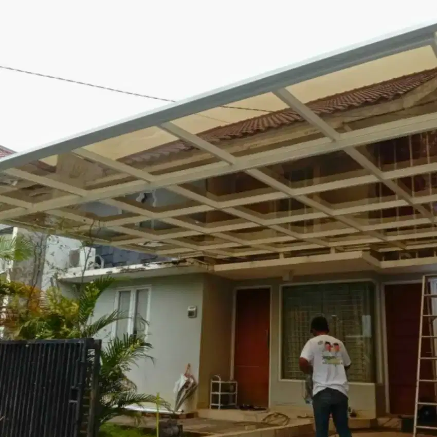 Kanopi carport atap solarflat mewah rangka hollow galvanis bergeransi