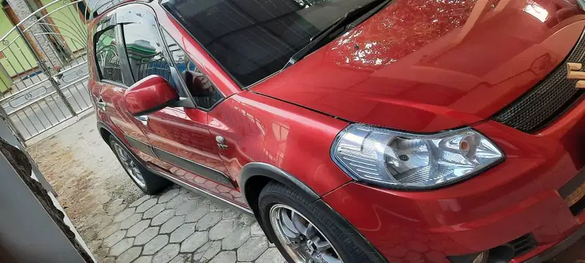 Di Jual SX 4 Over  Merah Metalik MT 2009