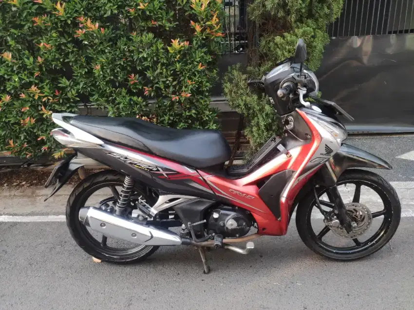 Honda supra x 125 helm in tahun 2014