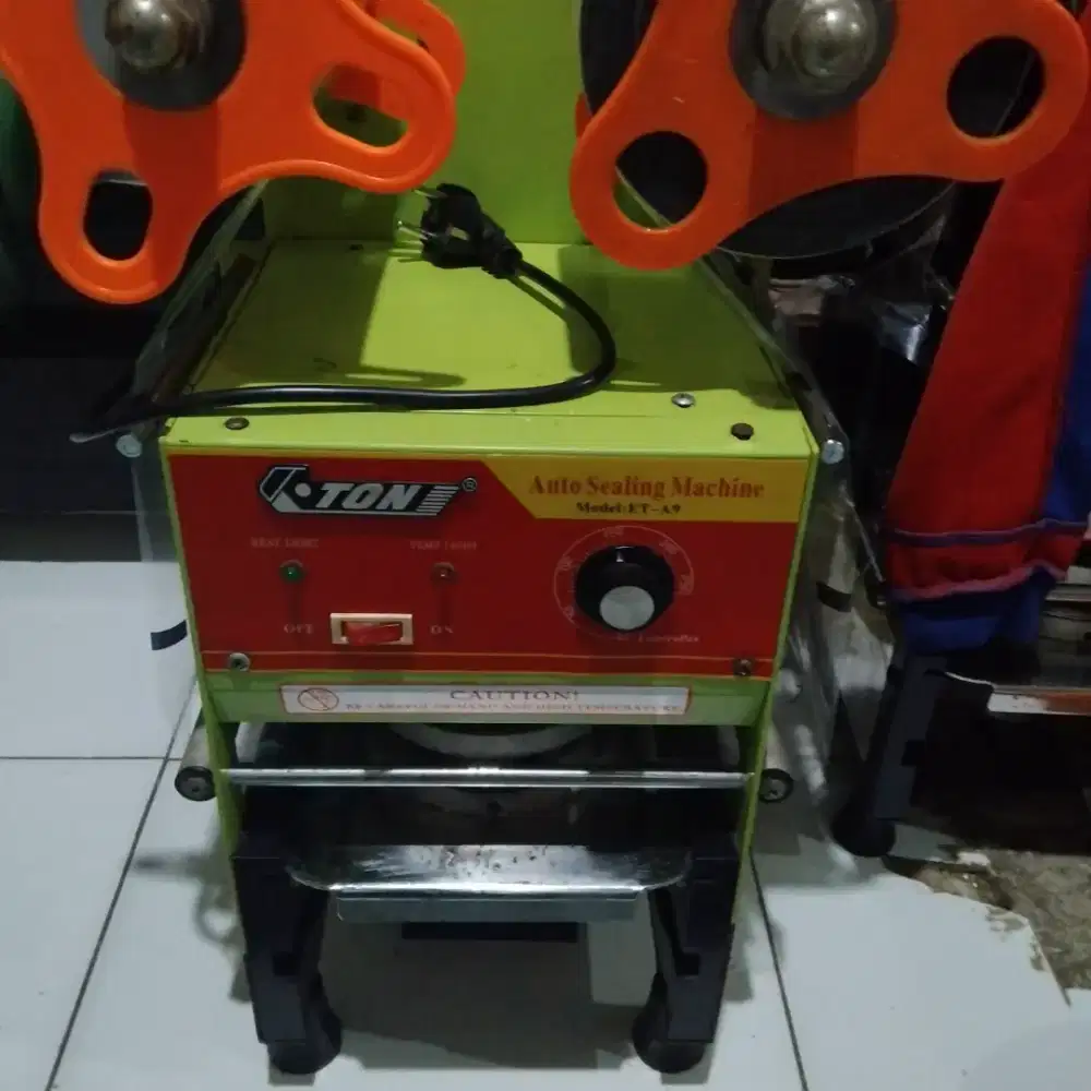 Cup sealer semi otomatis