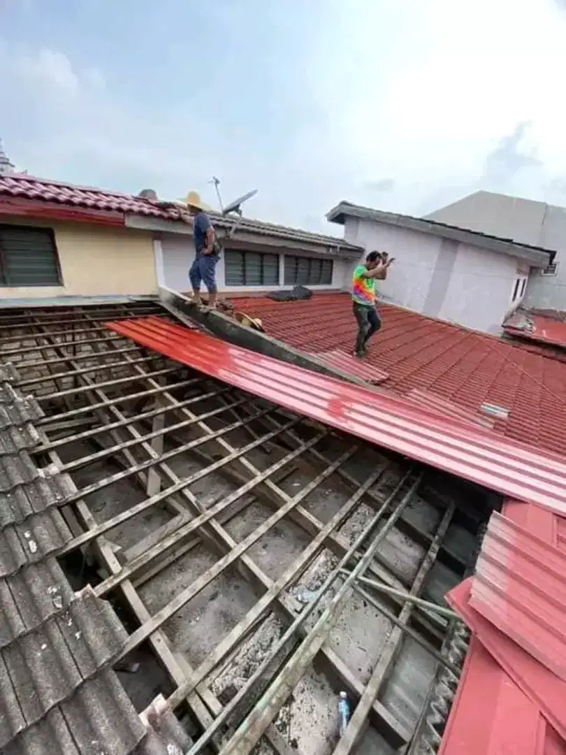 Tukang atap bocor perbaikan talang rembes renovasi rumah pasang baja