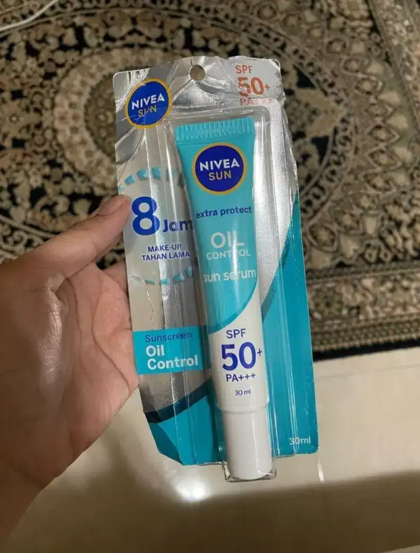 Nivea Oliy Sun Serum spf 50+++