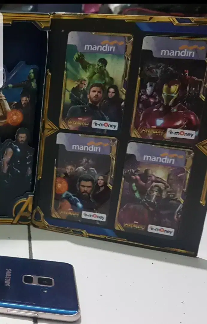 Kartu e money Mandiri, with avengers album