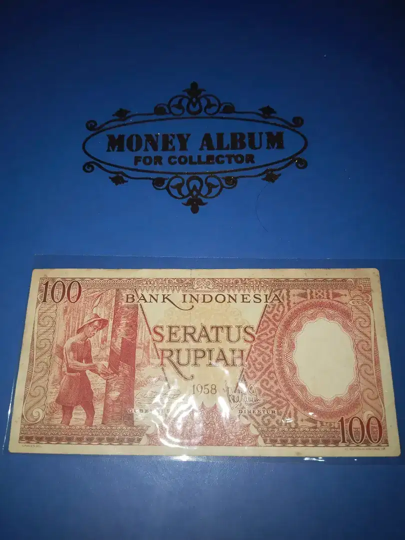 Uang Rp. 100 Pekerja