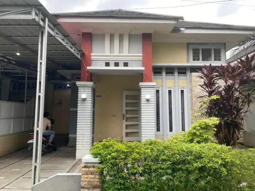 Rumah dijual lingkungan cluster tepi jalan besar Panam