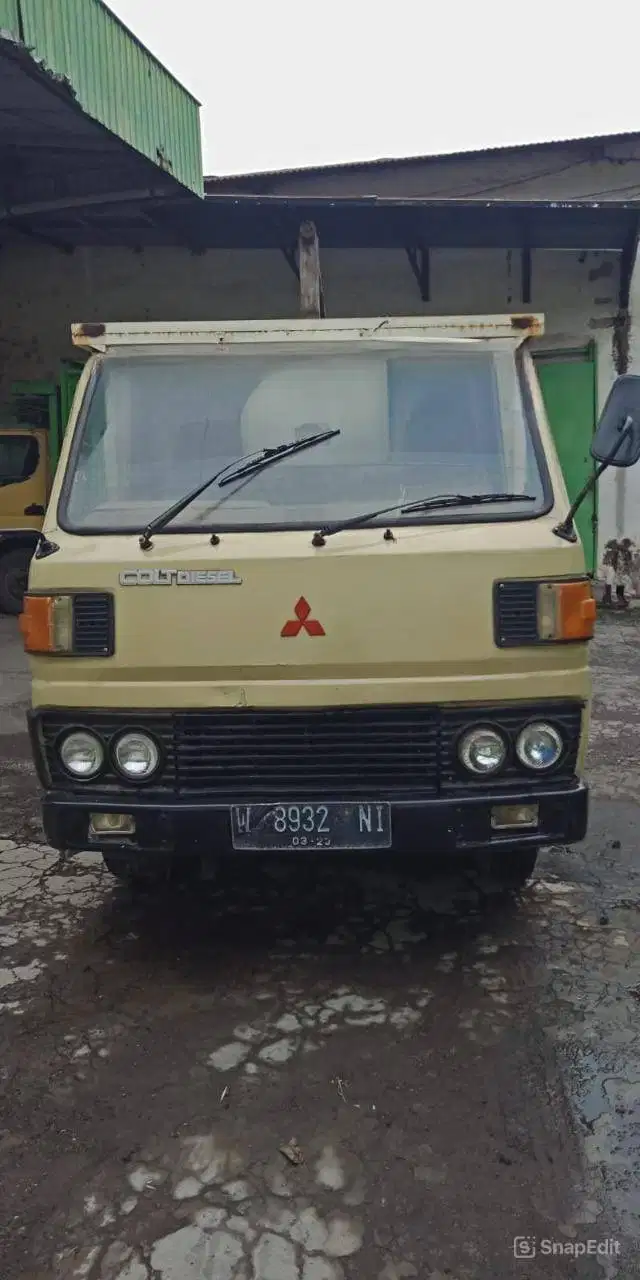 TRUK COLT DIESEL MITSUBISHI FE104 TAHUN 1993