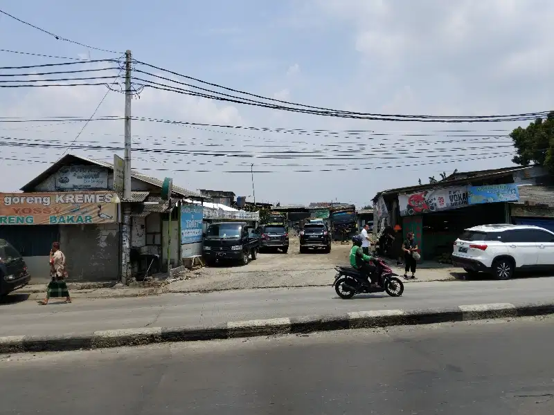 Kavling pinggir jalan raya wilayah ramai di Alamsutera siap bangun