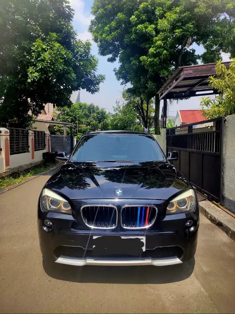 BMW X1 sDrive 2012 Black on Beige Istimewa