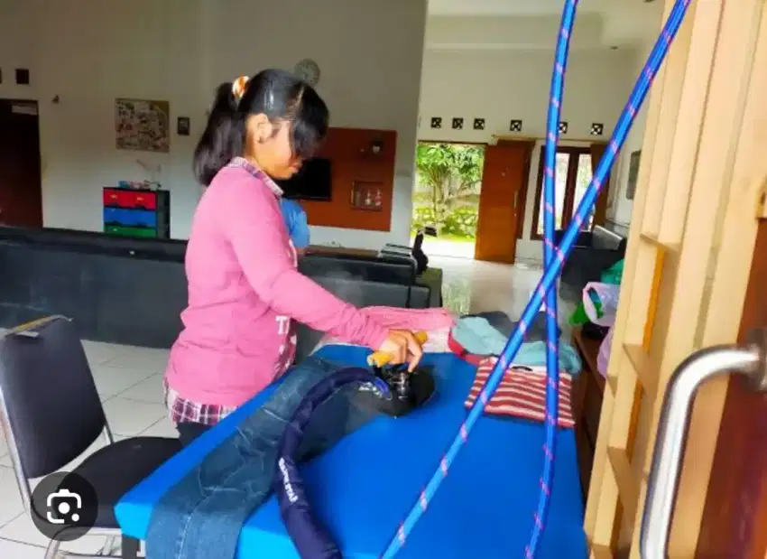 Tukang setrika Laundry dan Dryclean