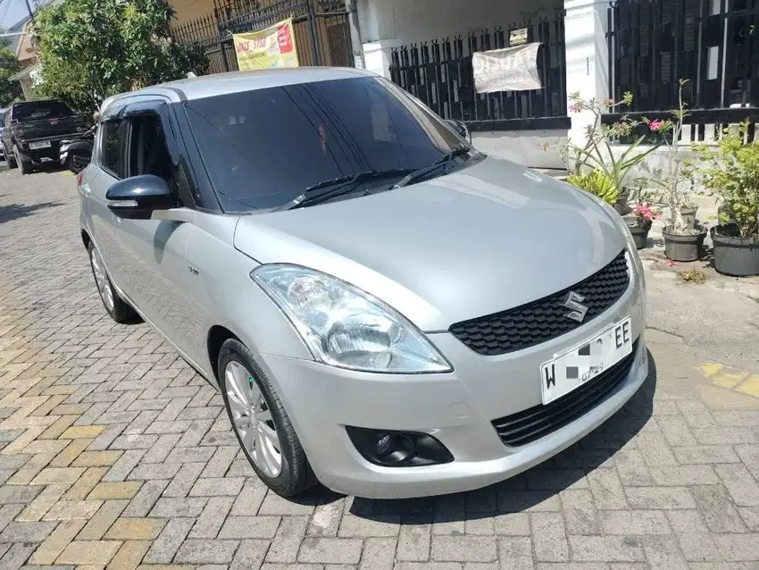 Suzuki Swift 1.4 GX Bensin Automatic/At 2014 TDP 20 Jt Langsung Proses