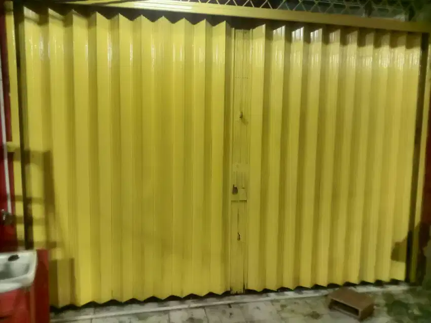 TUKANG SERVICE PINTU FOLDING GATE DAN ROLLING DOOR