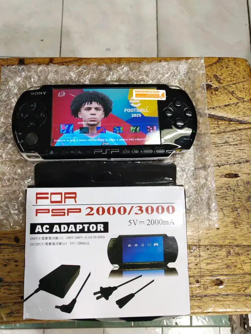 PSP SLIM 3006 PIANO BLACK MEMORI 64GB FULL GAME EFOOTBALL,PS3,PS2,PS1