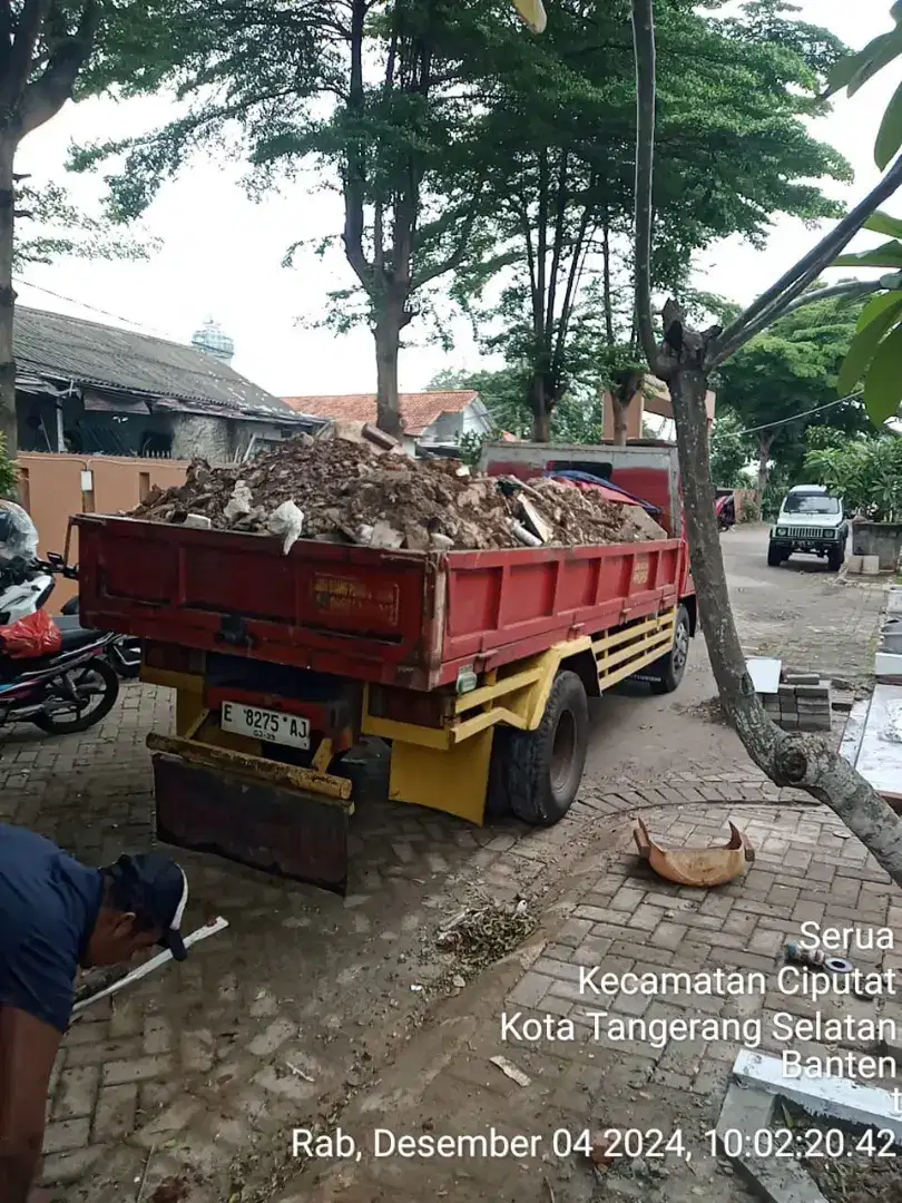 Buang puing sampah