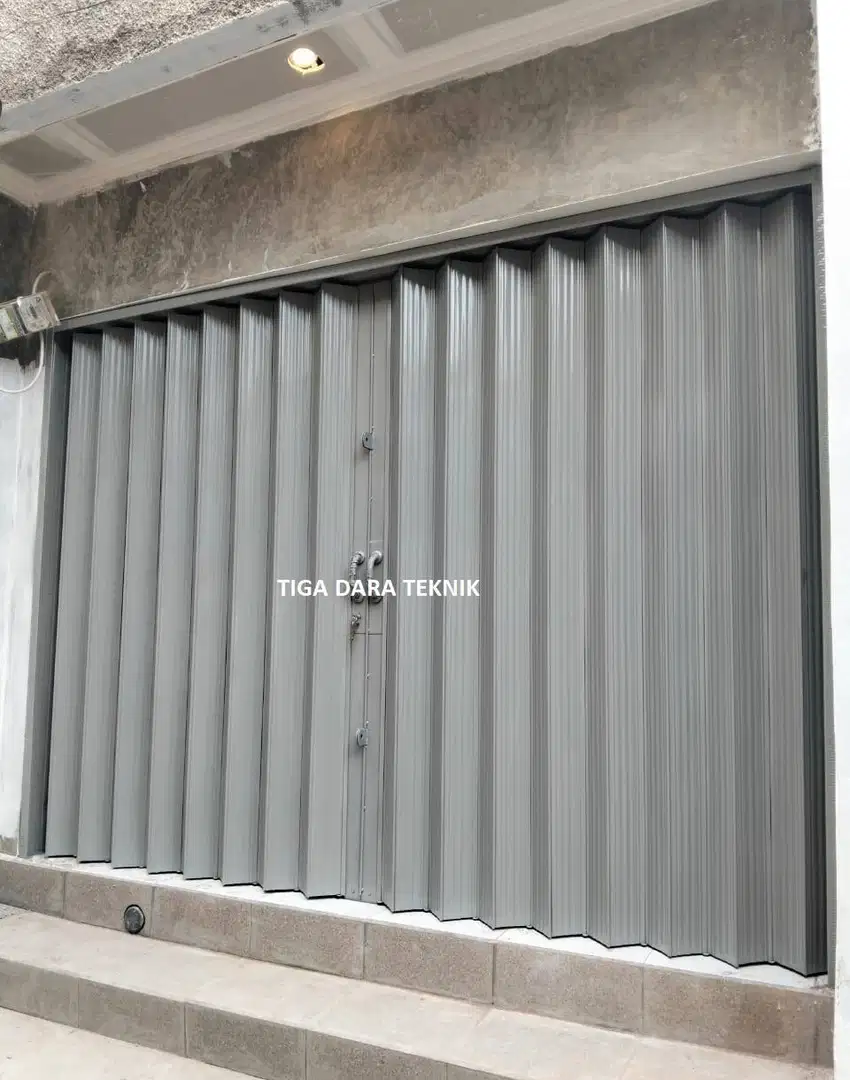 Pasang folding gate / pintu lipat terima beres, survey gratis