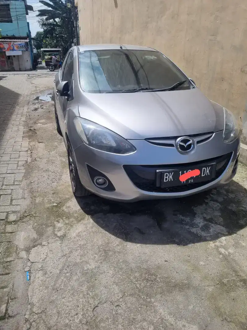 Dijual Cepat Mazda 2 Warna Silver Kondisi Siap Pakai