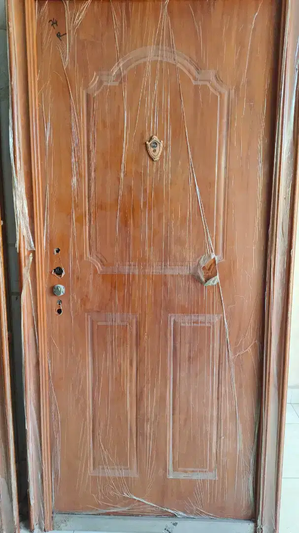 Pintu baja motif kayu kualitas import