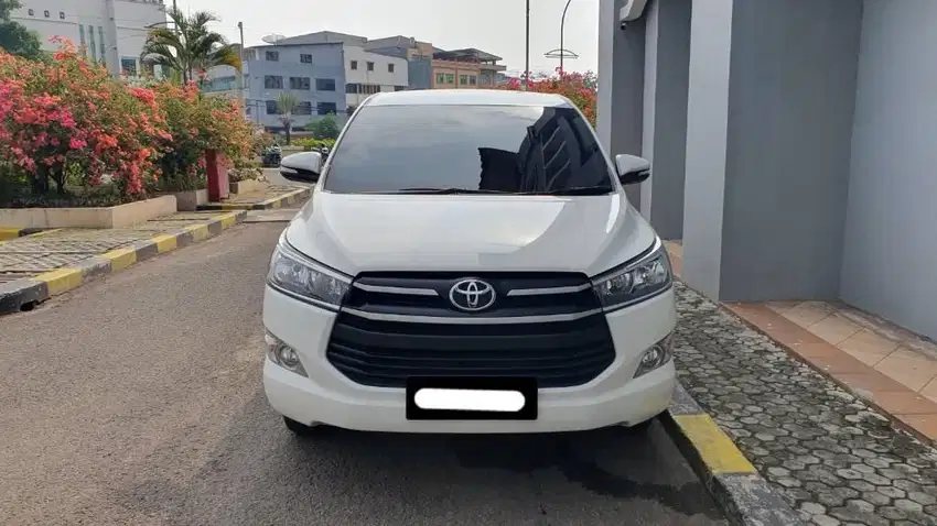 km 33 ribu toyota kijang innova g manual 2016 bensin putih tangan 1