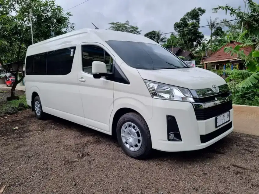 Sewa mobil pribadi hiace elf