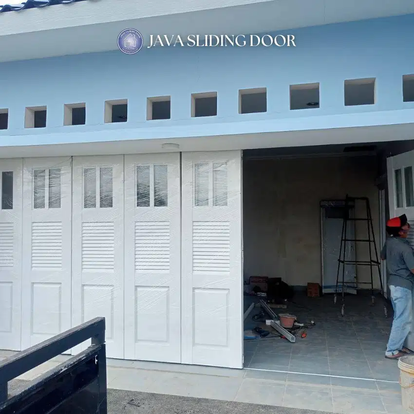 Pintu besi lipat / geser tikung | pintu garasi berkualitas terpercaya