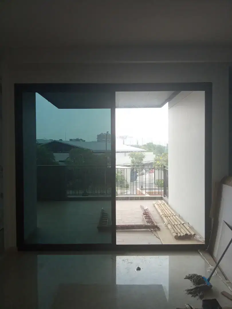 Jasa pasang Sticker kaca film Rumah