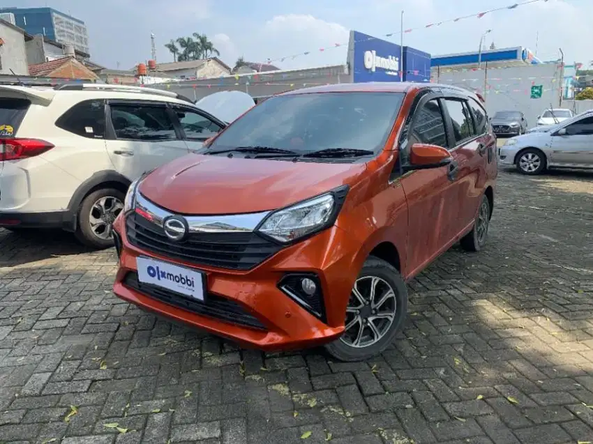 Like New TDP 6,JT Daihatsu Sigra 1.2 R Deluxe Bensin-MT Orange 2021