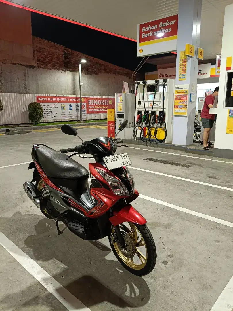 Suzuki Skywave merah merona