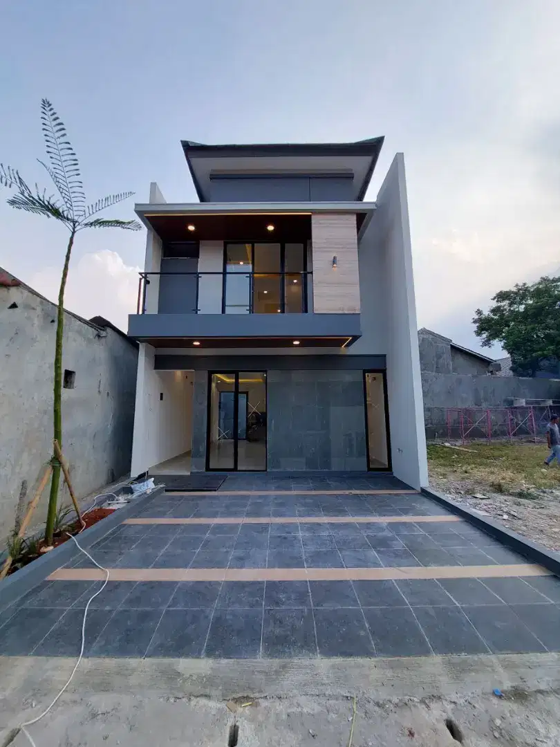 Rumah minimalis modern di apit 2 tol di Depok