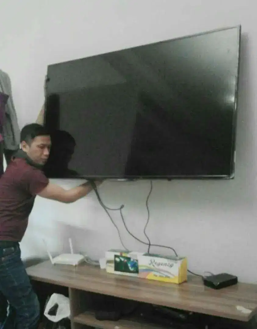 pemasangan & jual bracket utk gantungan tv led lcd di tembok kuat aman