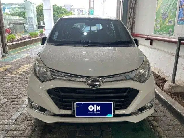 Daihatsu Sigra 1.2 R Bensin-AT 2016 Putih SOH