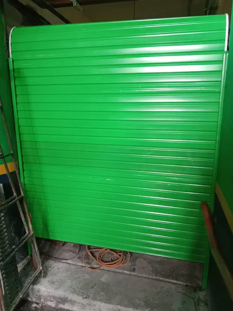 Folding gate rolling door