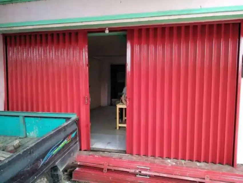 Tukang pasang pintu folding gate rolling door murah